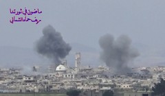 Không quân Nga không kích thị trấn Al-Lataminah. Ảnh minh họa video