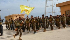 Lực lượng dân quân người Kurd rút khỏi thành phố phía bắc Syria Manbij. Ảnh Masdar News