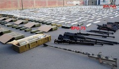  Một số vũ khí trang bị mà quân đội Syria thu giữ trên khu vực miền Nam, tỉnh Daraa và Quneitra. Ảnh: SANA.