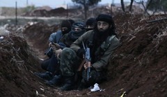 Những tay súng thánh chiến của nhóm Hay'at Tahrir Al-Sham trên chiến trường Latakia. Ảnh minh họa: Masdar News.