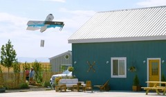 UAV giao hàng của Amazon sẽ thả gói hàng ở độ cao 3m xuống cho khách hàng. Ảnh CNBC