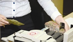 Các nhà làm chính sách vẫn tiếp tục loay hoay với vấn đề xử lý nợ xấu. Ảnh: TL