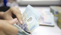 Việc cơ cấu lại TCTD bằng hình thức phá sản được cho là một hình thức răn đe, là động lực để các TCTD nâng cao chất lượng quản trị điều hành và trách nhiệm trong việc sử dụng nguồn tiền huy động. Ảnh: THÀNH HOA