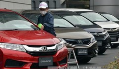 Ô tô của hãng Honda được trưng bày tại thủ đô Tokyo, Nhật Bản. Ảnh: AFP/TTXVN