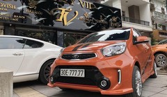 Chiếc xe Kia Morning biển ngũ quý 7 của anh Phạm Tùng sở hữu ngoại thất màu cam rực rỡ. Ảnh:  Phạm Tùng. 