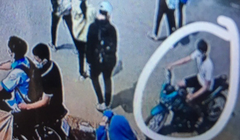 Người dân dùng điện thoại ghi hình nhóm người đâm học sinh lớp 9 (ảnh báo Tuổi trẻ)