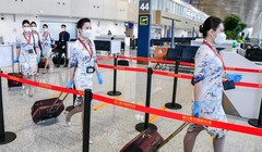 Tiếp viên nữ của Hàng không Hải Nam tại sân bay quốc tế Mỹ Lan Hải Khẩu (ảnh: Getty Images) 