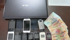 Tang vật của một đường dây cá độ bóng đá bị cơ quan công an thu giữ. (Ảnh minh họa. Nguồn: TTXVN)