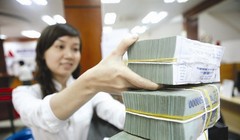 Các ngân hàng cho rằng tăng trưởng lợi nhuận 2016 sẽ giảm nhẹ. Ảnh minh họa: TL TBKTSG