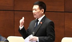 Bộ trưởng Bộ Tài chính Hồ Đức Phớc phát biểu tại Quốc hội chiều 25/7 (Ảnh: VGP)