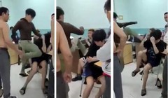 Hai thiếu niên 14 tuổi bị đấm đá dã man tại phòng giám thị Trường THCS Nguyễn Văn Tố, quận 10 (Ảnh cắt từ clip)
