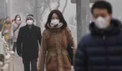 Khách du lịch và người dân Trung Quốc đeo khẩu trang để phòng bệnh (Ảnh: Internet)