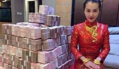 Hình ảnh cô dâu ngồi bên số hồi môn 'khủng' trong ngày cưới.