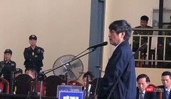 Bị cáo Nguyễn Thanh Hóa trong phiên xét xử sáng nay (23/11).