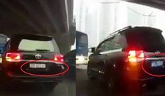 Chiếc Land Cruiser 7 chỗ đang chạy trên đường Phạm Văn Đồng bất ngờ đổi biển trắng sang biển xanh (ảnh: Cắt từ clip)
