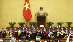 Chủ tịch nước Nguyễn Xuân Phúc, Thủ tướng Chính phủ Phạm Minh Chính, Chủ tịch Quốc hội Vương Đình Huệ và lãnh đạo Đảng, Nhà nước với các Phó Thủ tướng Chính phủ, một số Bộ trưởng và thành viên khác của Chính phủ vừa được Quốc hội phê chuẩn. Ảnh: TTXVN