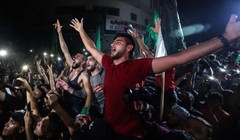 Người dân Gaza ăn mừng lệnh ngừng bắn giữa Israel và Hamas (Ảnh: Al Jazeera)