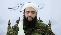 Hình ảnh thủ lĩnh HTS Abu Mohammed al-Jolani phát biểu tại một địa điểm không xác định năm 2016. Ảnh:: Reuters.