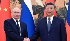 Tổng thống Nga Vladimir Putin và Chủ tịch Trung Quốc Tập Cận Bình trước cuộc gặp tại Bắc Kinh hôm 2/9. Ảnh: Reuters.