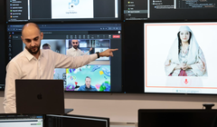 Các chuyên gia Albania làm việc tại Cơ quan Thông tin Xã hội Quốc gia với "Bộ trưởng" trí tuệ nhân tạo Diella, xuất hiện trên màn hình ở Tirana, Albania, ngày 12/9. Ảnh: NBC News.