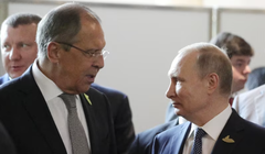 Ngoại trưởng Nga Sergei Lavrov và Tổng thống Vladimir Putin. Ảnh: Reuters.