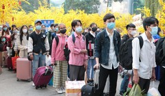 Người dân về quê ăn tết (Ảnh - Lê Thanh/Báo Thanh Niên)