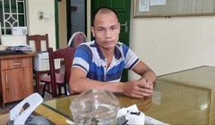 Phùng Văn Tú tại cơ quan công an.