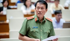 Bộ trưởng Bộ Công an Lương Tam Quang trả lời chất vấn. Ảnh: Quochoi.vn