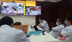 Bác sĩ BV Nhi đồng 1 hội chẩn từ xa ca bệnh nhi ở BV Sản nhi An Giang. (Ảnh: Nguyễn Trăm)