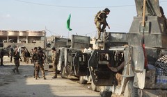 Lực lượng chính phủ Iraq tại khu vực gần Ramadi ngày 24.12.2015 - Ảnh: Reuters
