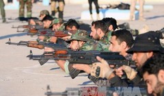 Binh sĩ Iraq tham gia cuộc diễn tập quân sự ở al-Zubair, gần thành phố Basra ngày 13/2. Ảnh: AFP/TTXVN