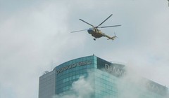 Trực thăng tham gia giải cứu người mắc kẹt trên sân thượng tòa nhà Diamond Plaza (quận 1, TP.HCM) trong buổi tổng diễn tập phương án chữa cháy, tìm kiếm cứu nạn, cứu hộ ngày 14.8.2013 (Ảnh: internet)