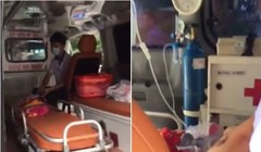 Hình ảnh cháu bé nằm trong xe cứu thương bị chặn tại BV Nhi TW (Ảnh cắt từ clip)