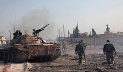 Quân đội Syria và lực lượng vũ trang địa phương NDF chiến đấu trong thành phố Aleppo