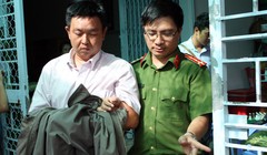 Trưởng đội Thanh tra giao thông số 3 Võ Hoàng Anh bị bắt tại nhà riêng. Ảnh: C.A