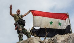 Binh sĩ Syria với lá cờ chiến thắng (ảnh minh họa)