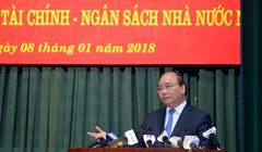 Thủ tướng Nguyễn Xuân Phúc phát biểu tại Hội nghị ngành tài chính sáng 8/1. Ảnh: VGP