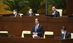 Bộ trưởng Nguyễn Kim Sơn trả lời chất vấn trước Quốc hội (ảnh VGP)