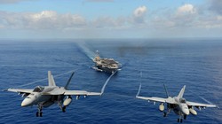 Chiến đấu cơ F/A-18 Super Hornet cất cánh từ tàu sân bay Mỹ. 