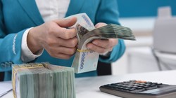 NHNN nới “room” tín dụng lên 14% cho toàn hệ thống ngân hàng