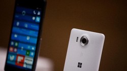 Doanh số thiết bị thông minh của Microsoft được dự báo chỉ tăng trở lại vào năm sau ẢNH: AFP