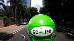 Gojek nói sẽ mở dịch vụ gọi xe 4 bánh và ví điện tử tại Việt Nam. Ảnh: Reuters
