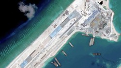 Đường băng đang được Trung Quốc xây cất với tốc độ kinh hoàng cũng như việc mở rộng đá Chữ Thập ở Trường Sa