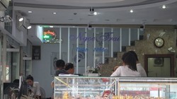 Hoạt động giao dịch tại tiệm vàng Ngọc Phát - Ảnh: Tiểu Thiên
