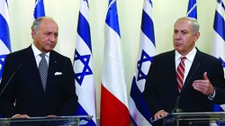 Ngoại trưởng Pháp Laurent Fabius và Thủ tướng Israel Benjamin Netanyahu trong chuyến thăm ngày 21/6.