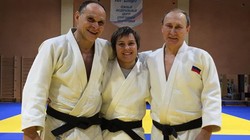 Nữ vận động viên người Briansk Kuzyutina cúng huấn luyên viên và tổng thống Nga