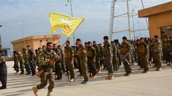 Lực lượng dân quân người Kurd rút khỏi thành phố phía bắc Syria Manbij. Ảnh Masdar News