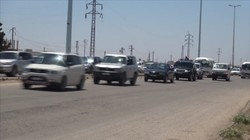 Dường quôc lộ Homs - Hama đã thông tuyến cho người dân. Ảnh minh họa video Ruptly