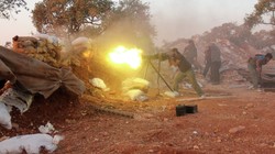 Lực lượng vũ trang địa phương NDF đánh trả các tay súng khủng bố NDF ỏ các thị trấn người Shiite. Ảnh minh họa Masdar News