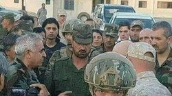 Thiếu tướng Susheil al Hassan, tư lệnh trưởng lực lượng Tiger ở Daraa cùng với các vệ sĩ Nga của minh